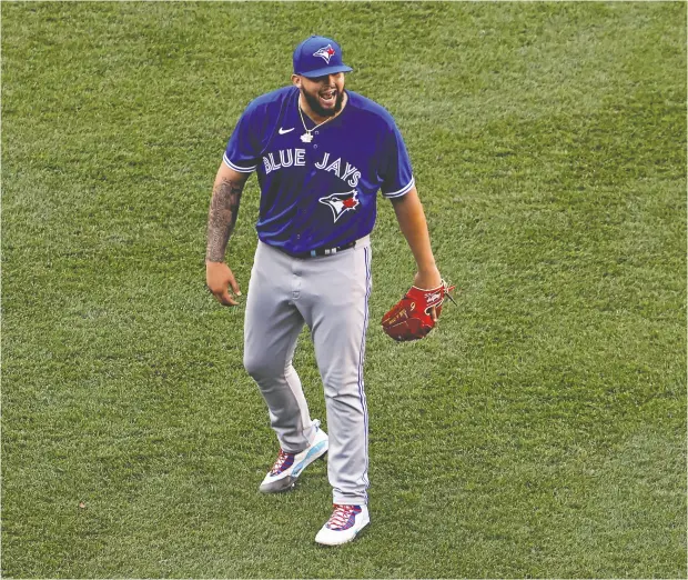  ?? WINSLOW TOWNSON / GETTY IMAGES ?? Pitcher Alek Manoah of the Toronto Blue Jays shouts at the Boston Red Sox dugout after striking out Bobby Dalbec on Saturday in Boston. Manoah
won the game 4-1 — the midpoint in a three-game series sweep that put the Blue Jays five games up on the Sox in the AL East standings.