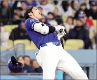  ?? PHOTO: EPA-EFE ?? The Los Angeles Dodgers’ Shohei Ohtani reacts after getting hit by a pitch during their spring training game against the Los Angeles Angels at Dodger Stadium in Los Angeles on Monday. The Angels won 6-0.