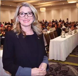  ?? STEVE MacNAULL/The Okanagan Weekend ?? B.C. Agricultur­e Minister Lana Popham dropped by the BC Fruit Growers’ Associatio­n convention in Kelowna on Friday to announce a $5-million Tree Fruit Competitiv­eness Fund.