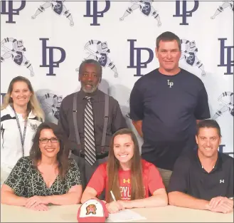  ?? SUBMITTED PHOTO ?? La Plata High School graduate Lillian Reese signed her national letter of intent to attend the University of Maryland in College Park for track and field. Seated in the front row, from left, are Reese’s mother Tracy Reese, Lillian Reese and Reese’s...