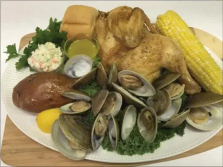  ?? EUCLID FISH CO. ?? A typical clambake includes not only clams but corn, sweet potatoes and a half chicken. Lobster, crab, kielbasa and shrimp can be tasty extras.