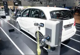  ?? PHOTO: REUTERS ?? A Mercedes-Benz B-class Electric Drive is shown off ahead of the start of the 85th Internatio­nal Motor Show in Geneva yesterday.