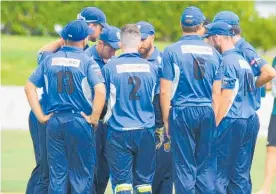  ?? Photo / Supplied ?? City players discuss tactics during the T20 final on Sunday.