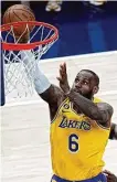  ?? Dylan Buell/Getty Images ?? The Lakers’ LeBron James goes up for a layup attempt against the Indiana Pacers.