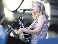  ?? Brett Le Blanc Las Vegas Review-Journal ?? Alyssa Oeder performs a set Saturday at the Country58 benefit concert in Henderson. The concert was put on to help Oct. 1 victims.