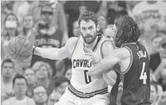  ?? KEN BLAZE, USA TODAY SPORTS ?? Kevin Love, left, scored 25 points ( 19 in the first half ) and had two assists against the Raptors in Game 5.