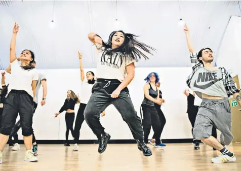  ??  ?? Popping up all over: dance students take a high-energy K-Pop dance class in London