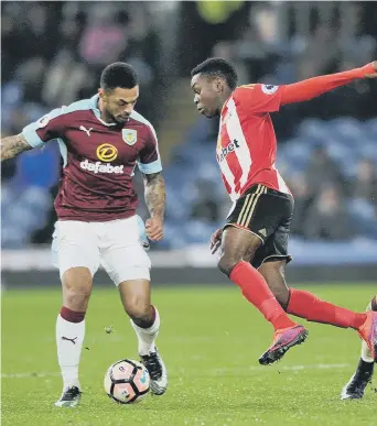  ??  ?? Sunderland’s Joel Asoro challenges Burnley’s Andre Gray in last night’s match.