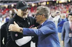  ?? KEVIN C. COX / GETTY IMAGES FILES ?? Head coach Dan Quinn and GM Thomas Dimitroff have the Falcons one win away from the Super Bowl.