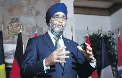  ?? FRED CHARTRAND / THE CANADIAN PRESS ?? “This system that we are putting into place looks after our veterans in a much more comprehens­ive way,” Defence Minister Harjit Sajjan says. But one disabled veteran dismisses it as “nothing more than a cost-saving measure.”