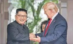  ?? REUTERS FILE ?? Kim Jong Un and Donald Trump displayed unexpected bonhomie in Singapore.