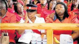  ?? ?? Mourners gather at the Giblatore Baptist Church in Bog Walk, St Catherine, last Saturday to pay their last respects to Constable Davan Cooper.