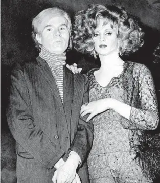  ?? Associated Press ?? ANDY WARHOL, left, on the town with trans actress Candy Darling in 1969.