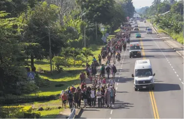  ?? Rodrigo Abd / Associated Press ?? Honduran migrants are part of a second caravan of more than 1,000 that entered Mexico from Guatemala.