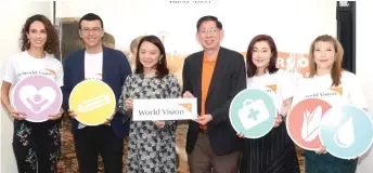  ?? Photo — Bernama ?? Yeoh (third left) attends World Vision Malaysia 70th Anniversar­y celebratio­n at The Ledge Art Gallery.