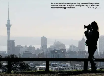  ?? Photo / Greg Bowker ?? An economist has said protecting views of Mangawhau from the Harbour Bridge is costing the city $1.4b in lost developmen­t opportunit­ies.