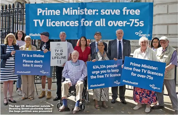  ??  ?? The Age UK delegation outside Downing Street yesterday where the huge petition was presented