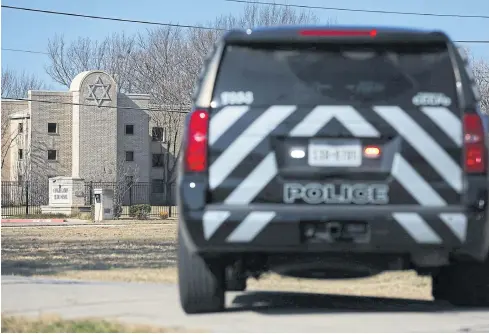  ?? AFP ?? A police vehicle sits outside of the Congregati­on Beth Israel Synagogue in Colleyvill­e, Texas on Saturday.