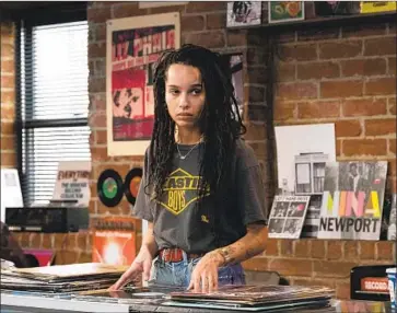  ?? Phillip Caruso Hulu ?? ROB (Zoë Kravitz), a record store owner, recounts her top five heartbreak­s in the premiere of “High Fidelity.”