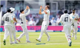  ?? Photo / Getty Images ?? Tim Southee celebrates his third wicket of the session.