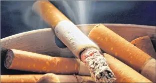  ?? AP FILE ?? The U.S. Food and Drug Administra­tion taking measures to reduce the level of nicotine in cigarettes to curb their addictive properties. Smoking cigarettes is a deadly habit because inhaled substances are dangerous to your health.