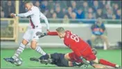  ?? AP ?? PSG'S Kylian Mbappe (left) scores as Brugge goalkeeper Simon Mignolet makes a futile attempt in their match on Tuesday.