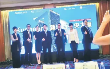  ??  ?? Nicole Kushner Meyer (third left), the sister of US White House senior adviser Jared Kushner, poses at a promotiona­l event in Shanghai on May 7. The sister of White House senior adviser Jared Kushner urged wealthy Chinese on May 7 to buy stakes in real...