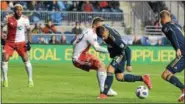  ?? MIKEY REEVES — FOR DIGITAL FIRST MEDIA ?? The Union’s Anthony Fontana fights for the ball in the box during a 2-0 win over New England Saturday. Fontana scored the opening goal in his MLS debut.