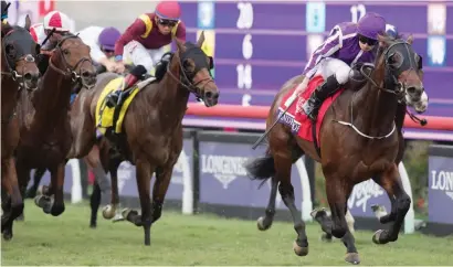  ??  ?? RYAN’S REVENGE. Ryan Moore suffered a nightmare up the inside on Coolmore’s dual Group 1 winner Happily in the Juvenile Fillies Turf, he was always in the right place on stablemate Mendelssoh­n in the colts’ equivalent.