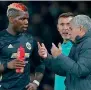  ?? AFP ?? Jose Mourinho talks with Paul Pogba during a match. —