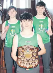  ?? ?? LEFT - Students Aidan Maher, Senan O’Reilly and Patrick Verling proudly display their Munster plaque and medals.