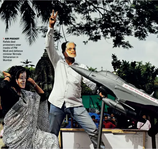  ??  ?? AIR POCKET Rafale deal protesters wear masks of PM Modi and defence minister Nirmala Sitharaman in Mumbai