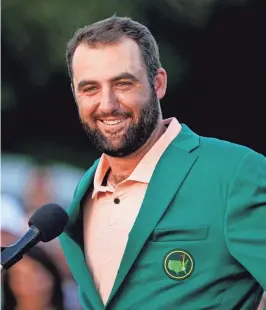  ?? ADAM CAIRNS/USA TODAY NETWORK ?? Scottie Scheffler speaks at the green jacket ceremony after winning the Masters Tournament on Sunday at Augusta, Ga.
