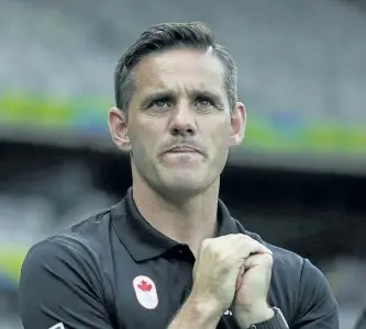  ?? THE ASSOCIATED PRESS FILES ?? Canada coach John Herdman stands on the sideline during a semifinal match of the women’s Olympic soccer tournament against Germany in Belo Horizonte, Brazil in 2016. Herdman, who coached the Canadian women’s team to internatio­nal prominence, has been...