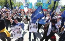  ?? VINCE TALOTTA/TORONTO STAR ?? It has been nearly five weeks since the Ontario Secondary School Teachers’ Federation hit the picket lines in Durham.