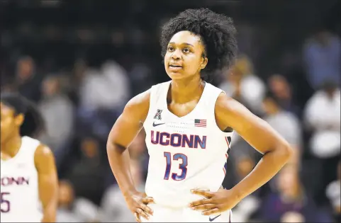  ?? Stephen Dunn / Associated Press ?? Christyn Williams (13) takes a breather during the second half of UConn’s win over California on Sunday in Storrs.