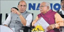  ?? HT PHOTO ?? Union home minister Rajnath Singh and Haryana chief minister Manohar Lal Khattar at the launch of Student Police Cadet programme at Gurugram on Saturday.