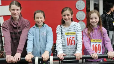  ?? Photo by Declan Malone ?? Naomi Gardiner, Rachel King, Kíla Massett and Orlagh King at the start of the Hope Guatelala charity walk from Dingle to Páidí Ó Sé’s pub on Sunday.