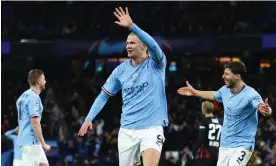  ?? Photograph: Carl Recine/Reuters ?? Erling Haaland celebrates his fifth goal of the night as Manchester City powered into the Champions League quarter-finals.