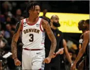  ?? AARON ONTIVEROZ — THE DENVER POST ?? Bones Hyland (3) of the Denver Nuggets flexes as he gets hot against the Phoenix Suns during the second quarter at Ball Arena in Denver on Wednesday, January 11, 2023.