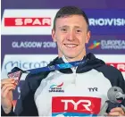  ?? Picture: Getty. ?? Max Litchfield with his bronze medal.