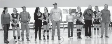  ?? MARK HUMPHREY ENTERPRISE-LEADER ?? Prairie Grove honored senior volleyball players on Thursday. (From left): Taylor Adam, escorted by her parents, Dawn and Chris Patterson; Cassidy Dryer, escorted by her parents, Tonya and Patrick Dryer; Kendra Happy, escorted by her mother, Quiata...
