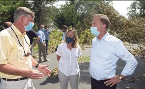 ?? H John Voorhees III / Hearst Connecticu­t Media file photo ?? State Sen.Julie Kushner, D-24, in August 2020 alongside Gov. Ned Lamont, right, and TJ Wiedle, director of emergency management for the city of Danbury.