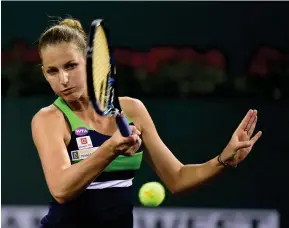  ??  ?? Karolina Pliskova plays a forehand in her match against Monica Puig at Indian Wells Tennis Garden on Friday night. (AFP)