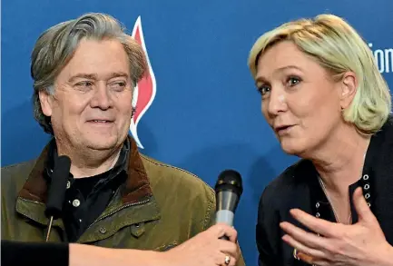  ?? PHOTO: AP ?? Former White House adviser Steve Bannon with French National Front leader Marine Le Pen at a National Front party conference in Paris at the weekend.