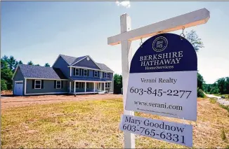  ?? CHARLES KRUPA/AP ?? The median price of a new home sold in July climbed to an unpreceden­ted $390,500, up 18.4% from a year ago, while the average sales price in July hit a record $446,000, up 17.6% from a year ago.