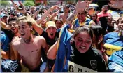  ??  ?? PASSION: Boca Juniors fans gather before their big game with River Plate was called off