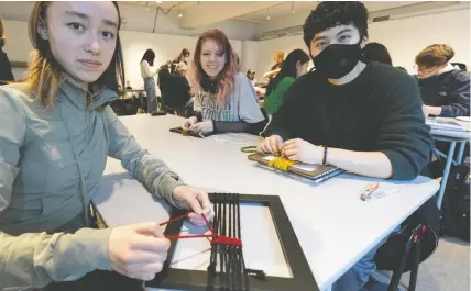  ?? PHOTOS: ARLEN REDEKOP ?? Sophia Coller, left, Imogen McMahon and Bobo Lee Culham attend an art class with the Teen Art Group (TAG) program at the Vancouver Art Gallery last month.