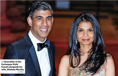  ?? Ian West ?? Chancellor of the Exchequer Rishi Sunak alongside his wife, Akshata Murthy