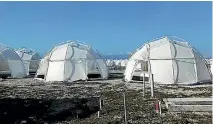  ??  ?? Organisers used glamorous images, left, to promote Fyre Festival but the reality was more a holiday from Hell at a ‘’disaster tent city’' .
